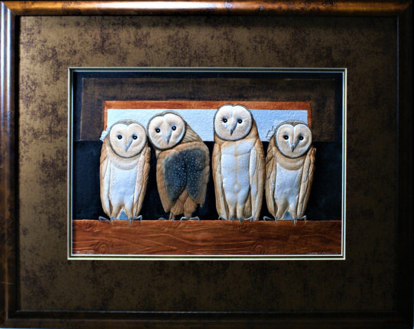 Four Barn Owls